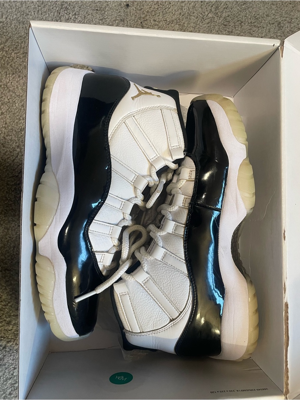 Jordan Retro 11 Low-Top Sneakers in White, Black & Gold